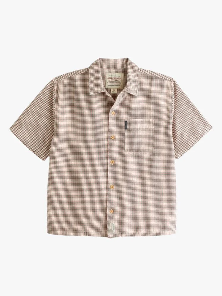 Image may contain: Clothing, Shirt, Home Decor, Linen, Sleeve, and Blouse