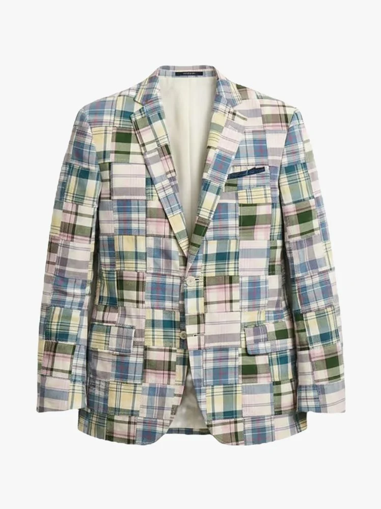 Image may contain: Blazer, Clothing, Coat, Jacket, and Shirt