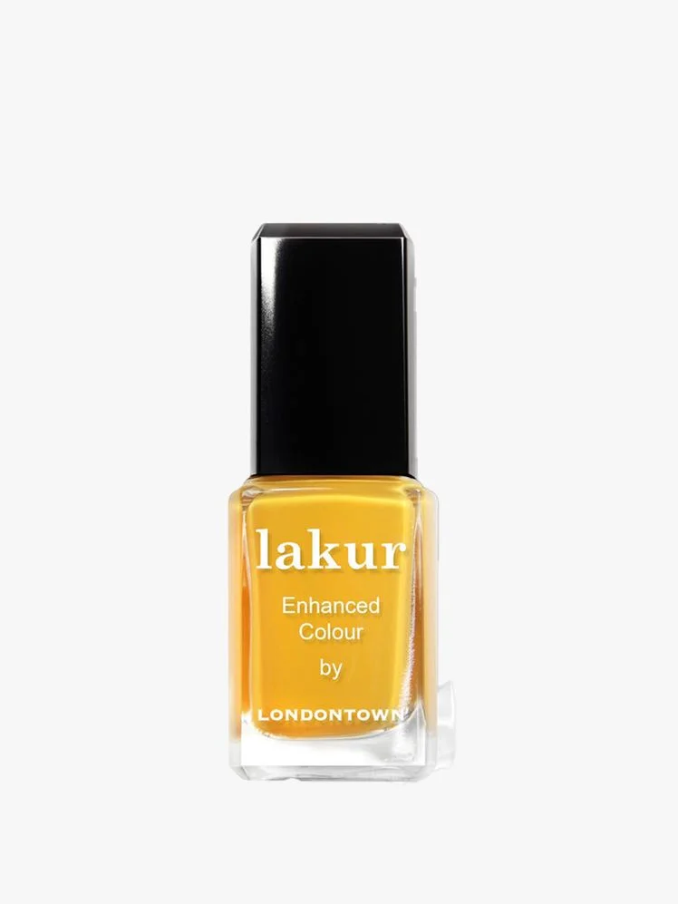 Image may contain: Bottle, Cosmetics, Perfume, and Nail Polish