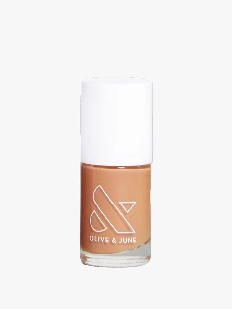 Image may contain: Cosmetics, Face, Head, Person, Bottle, and Perfume