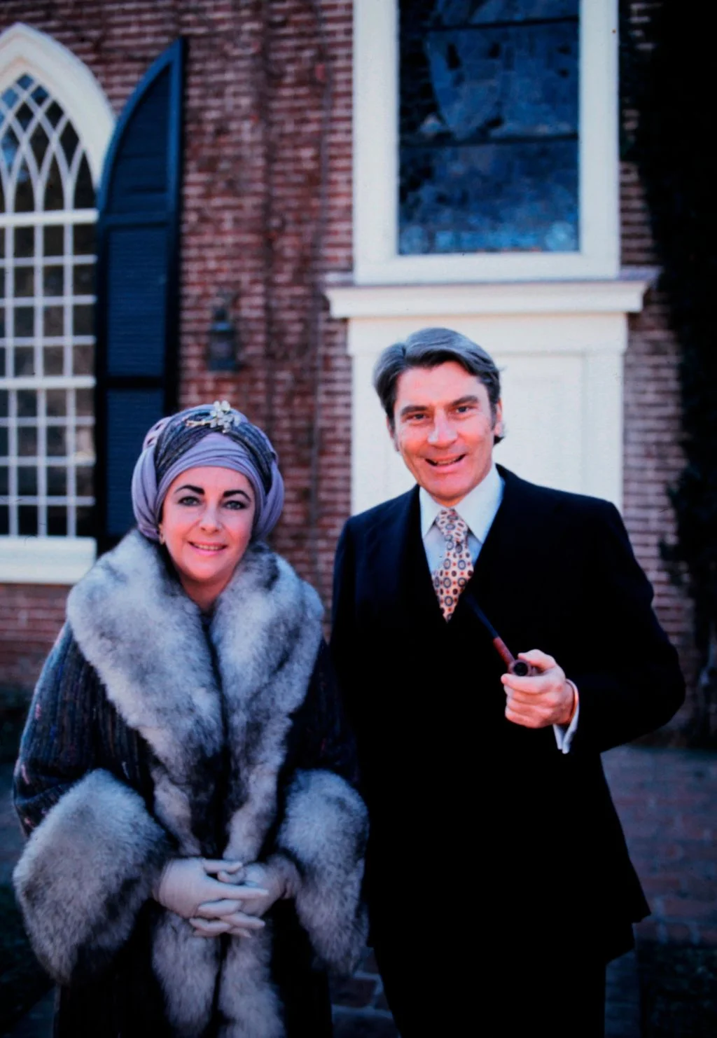 Image may contain Clothing Apparel Suit Coat Overcoat Tie Accessories Accessory Human Person Tuxedo and Jacket