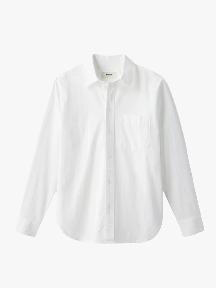 Image may contain: Clothing, Shirt, Long Sleeve, Sleeve, Home Decor, Linen, and Dress Shirt