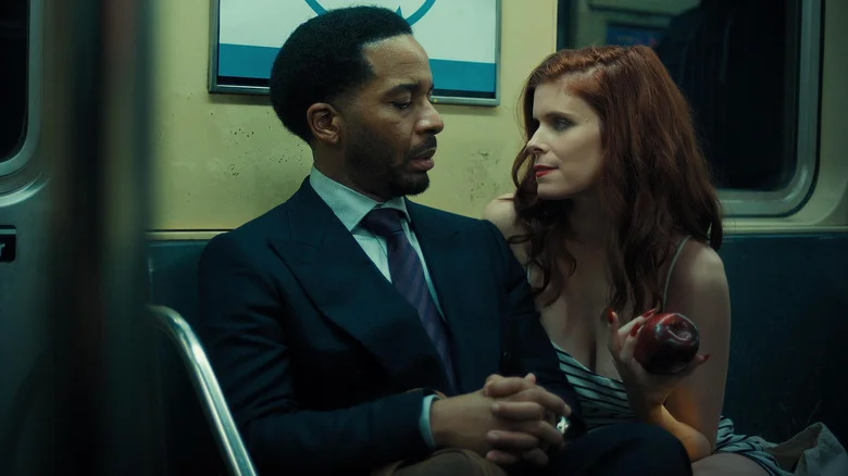 Andre Holland as Clay sitting by Kate Mara as Lula on the subway in The Dutchman
