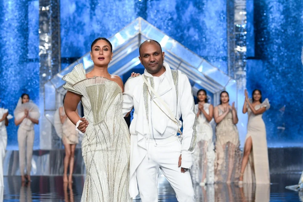 Bollywood actress Kareena Kapoor Khan and Designer Gaurav Gupta on ramp during LAKMÉ ABSOLUTE GRAND FINALE PRESENTS GAURAV GUPTA Fashion show by designer Gaurav Gupta at the FDCI x Lakmé Fashion Week 2021 at Jio World Convention Centre in Mumbai, India on 10th October 2021