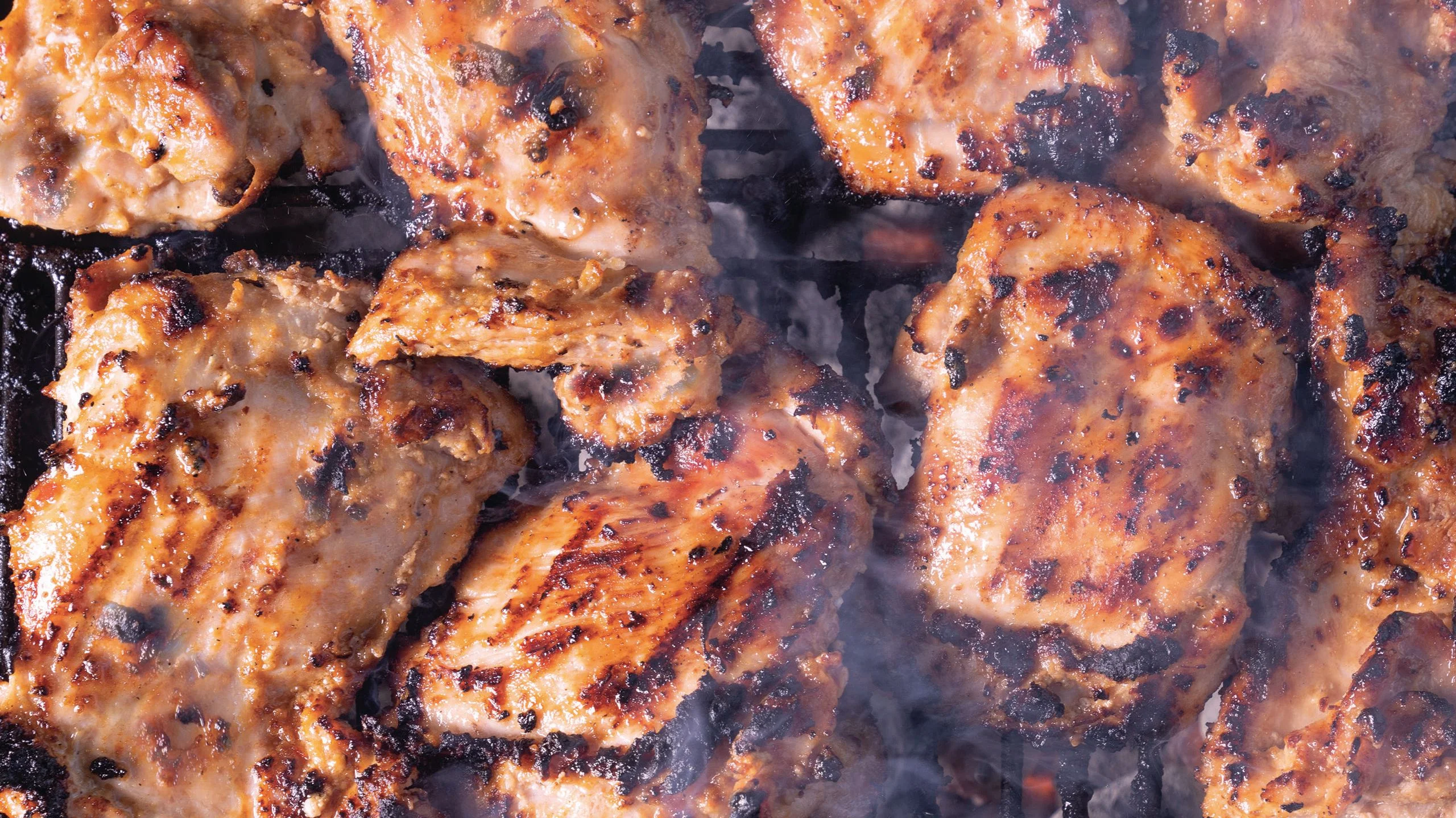 Misopeanut hibachi chicken on a grill