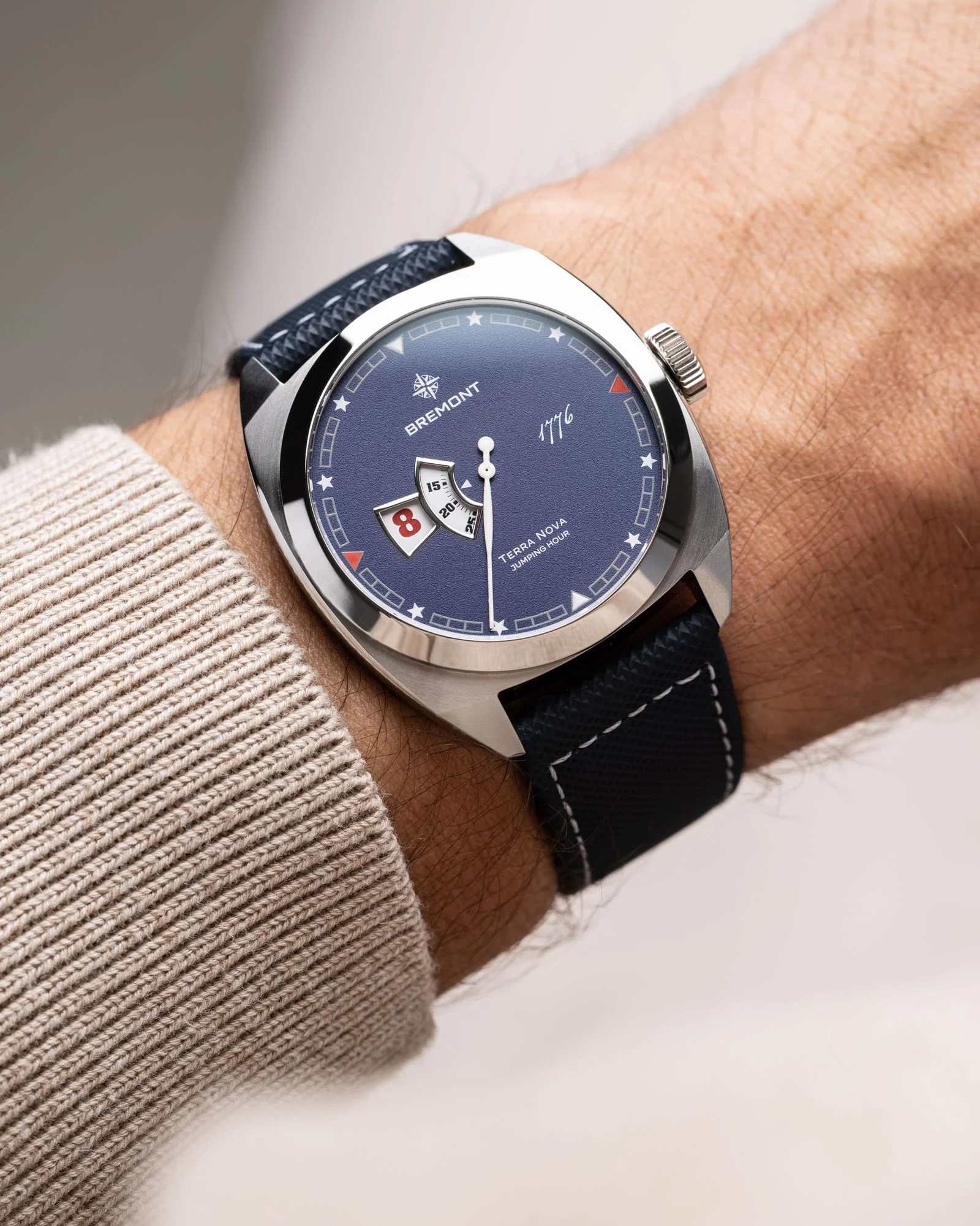 Image may contain Wristwatch Arm Body Part and Person