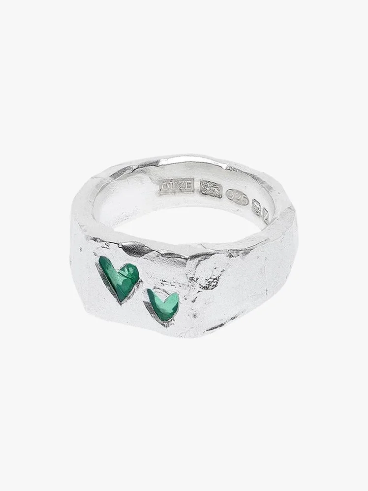 Image may contain: Accessories, Jewelry, Gemstone, Emerald, Ring, and Silver