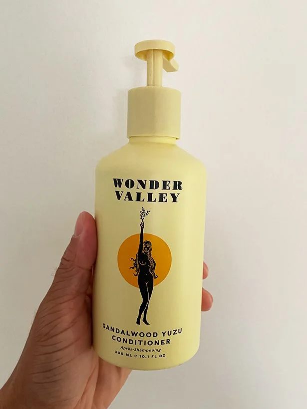 Image may contain: Bottle, Lotion, Cosmetics, Perfume, and Person