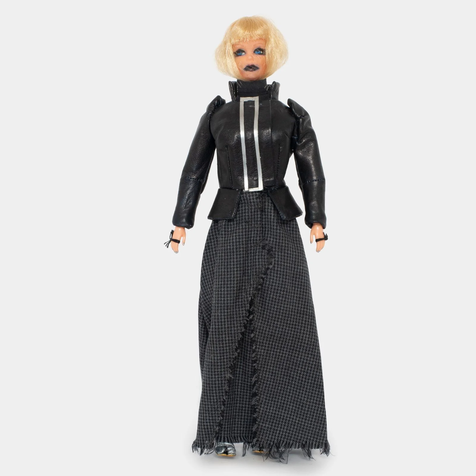 Image may contain Adult Person Doll Toy Figurine Clothing Coat Face and Head