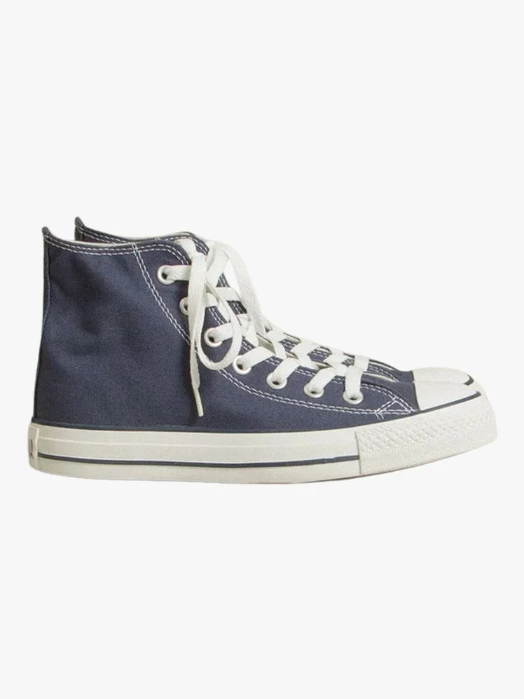Image may contain Clothing Footwear Shoe Sneaker and Canvas