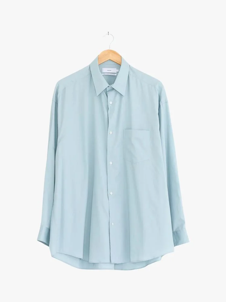 Image may contain Clothing Long Sleeve Shirt Sleeve Blouse and Dress Shirt
