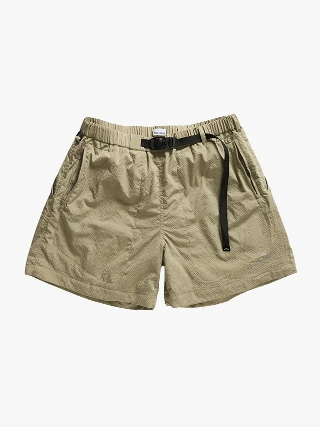Image may contain Clothing Shorts Skirt and Khaki