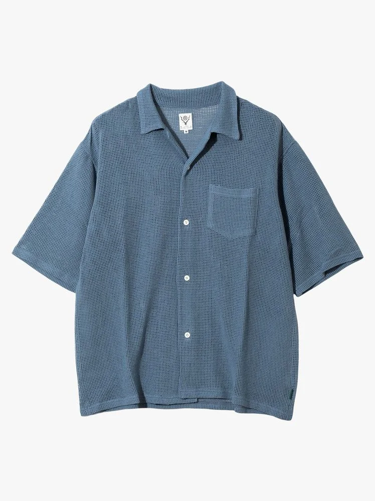 Image may contain Clothing Shirt Pants Long Sleeve Sleeve and Jeans