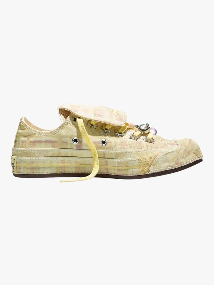 Image may contain Clothing Footwear Shoe Sneaker and Canvas