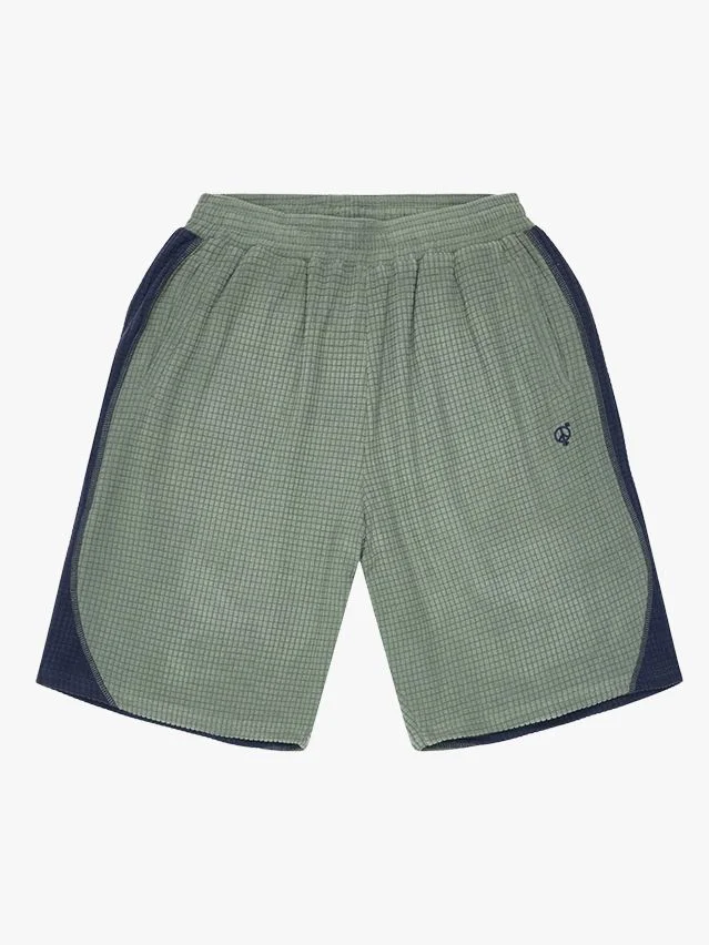 Image may contain Clothing Shorts and Swimming Trunks