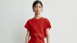 Image may contain Natasha Liu Bordizzo Clothing Dress Sleeve Adult Person Formal Wear Evening Dress and Fashion