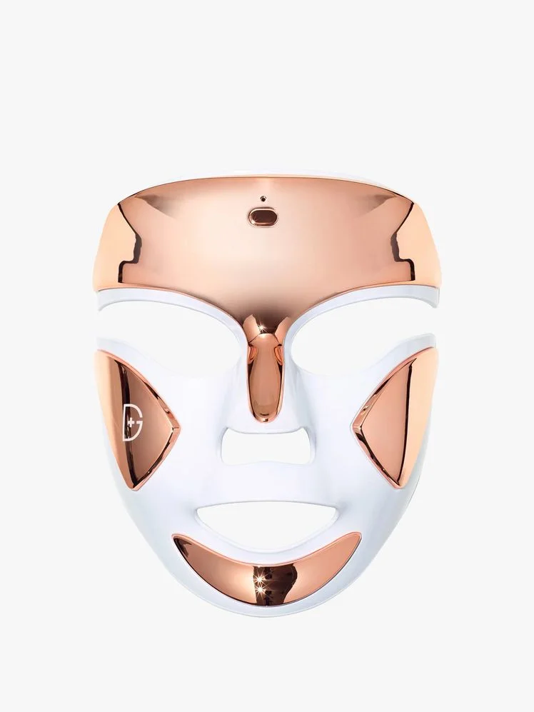Image may contain: Mask, Chandelier, and Lamp