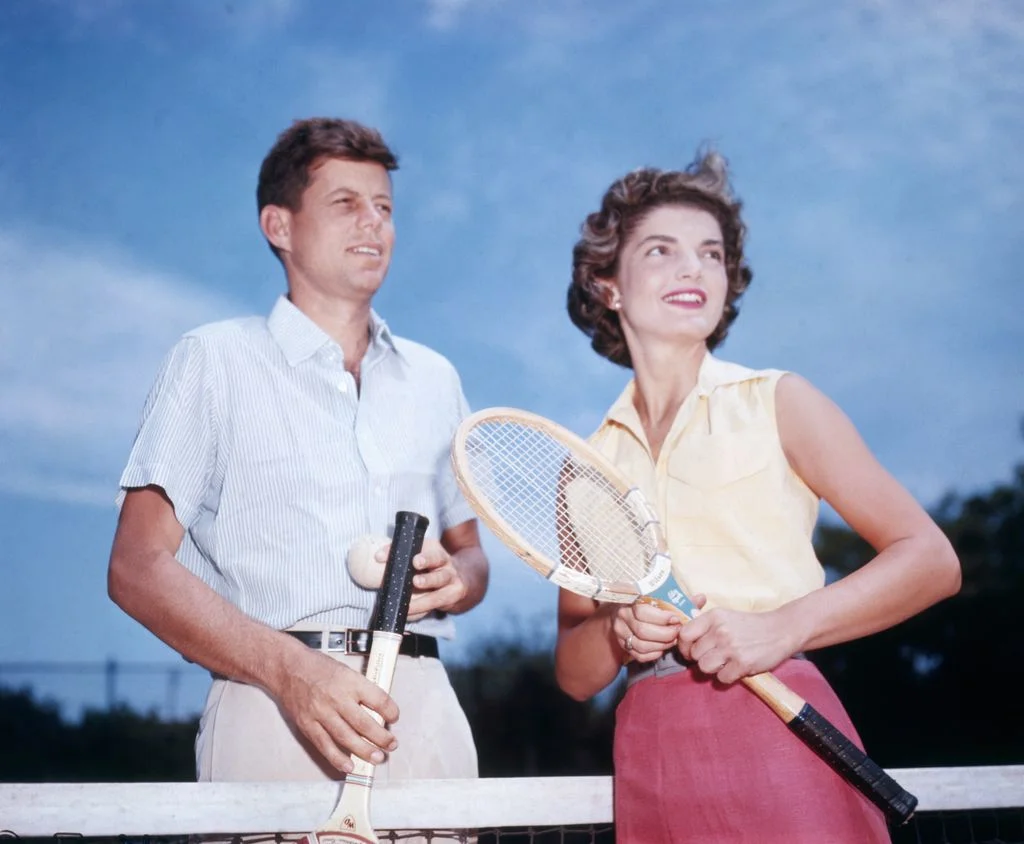 Image may contain John F. Kennedy Jacqueline Kennedy Onassis Racket Sport Tennis Tennis Racket Adult and Person