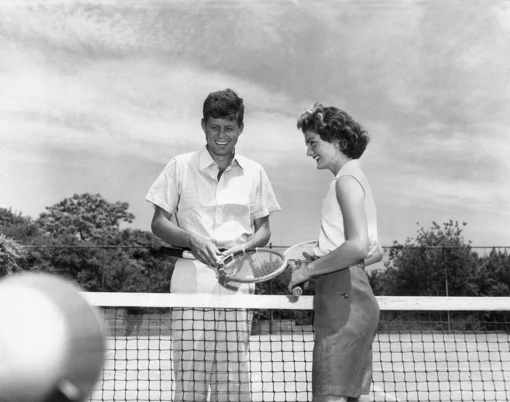 Image may contain John F. Kennedy Jacqueline Kennedy Onassis Racket Sport Tennis Tennis Racket Adult and Person