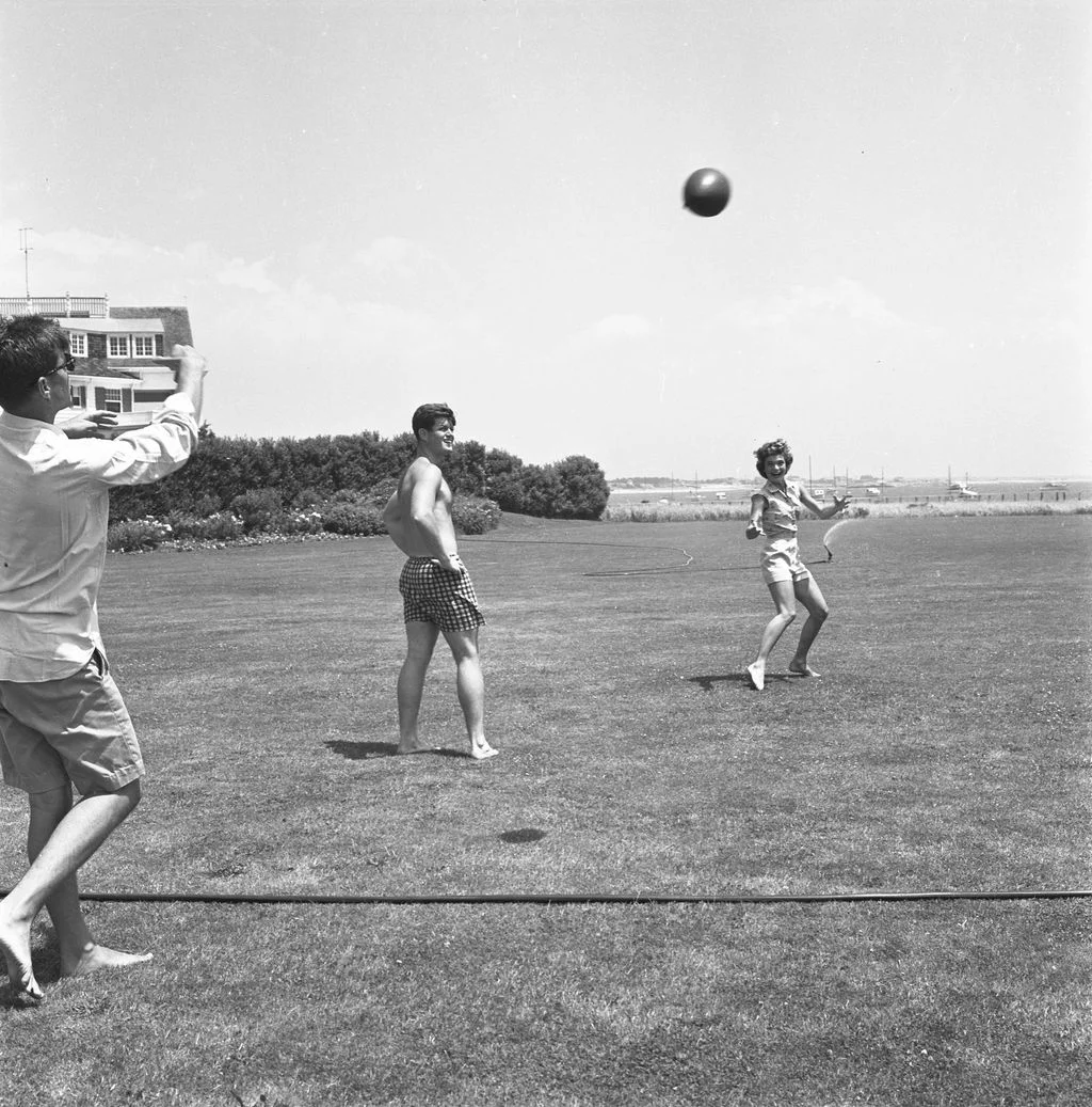 Image may contain Jacqueline Kennedy Onassis Clothing Shorts People Person Adult Child Footwear Shoe and Ball
