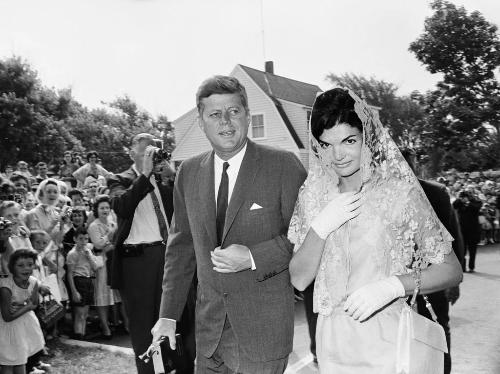 Image may contain John F. Kennedy Jacqueline Kennedy Onassis Eric Shea Jack Kamen Kate Beaton Clothing and Formal Wear