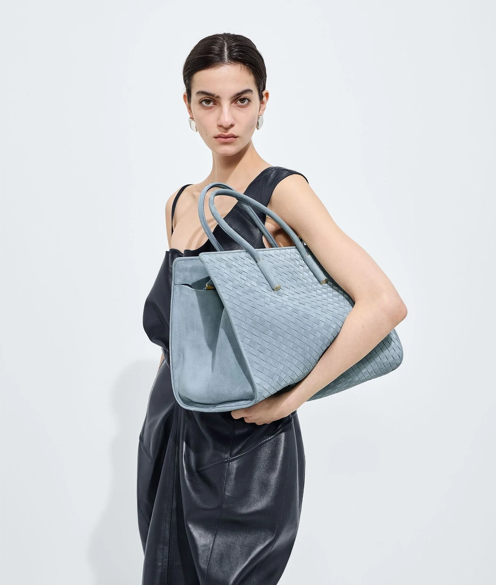 Image may contain Patricia Castañeda Accessories Bag Handbag Purse Tote Bag Adult and Person
