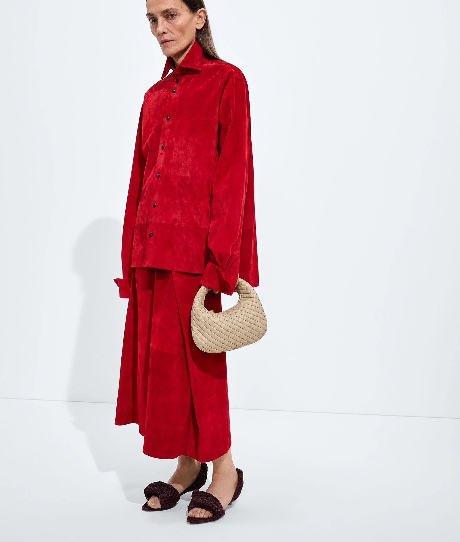 Image may contain Laura Ponte Clothing Coat Long Sleeve Sleeve Skirt and Velvet