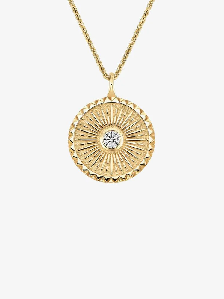 Image may contain: Accessories, Jewelry, Necklace, Pendant, Diamond, and Gemstone