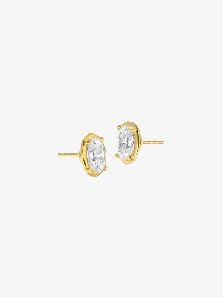 Image may contain: Accessories, Earring, Jewelry, Diamond, and Gemstone