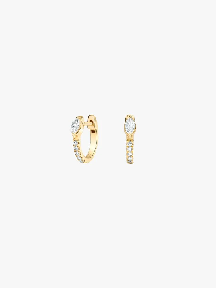 Image may contain: Accessories, Diamond, Gemstone, Jewelry, Earring, Ring, and Gold