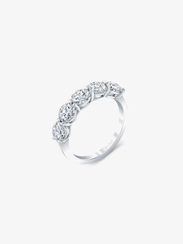 Image may contain: Accessories, Diamond, Gemstone, Jewelry, Platinum, Silver, and Ring