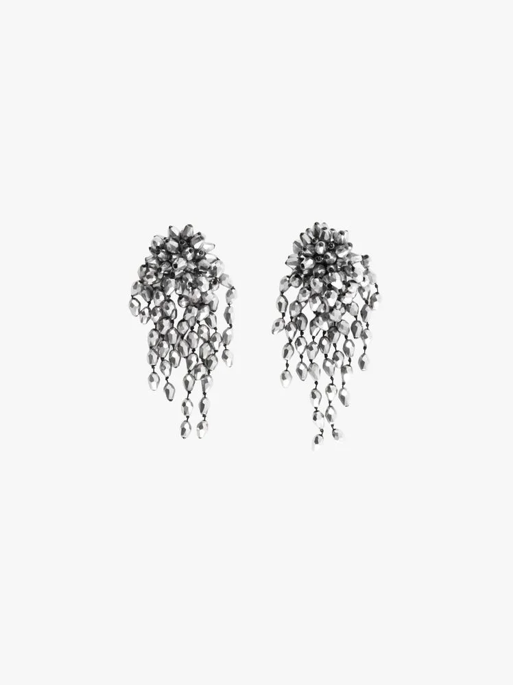 Image may contain: Accessories, Earring, Jewelry, Art, Plant, and Tree