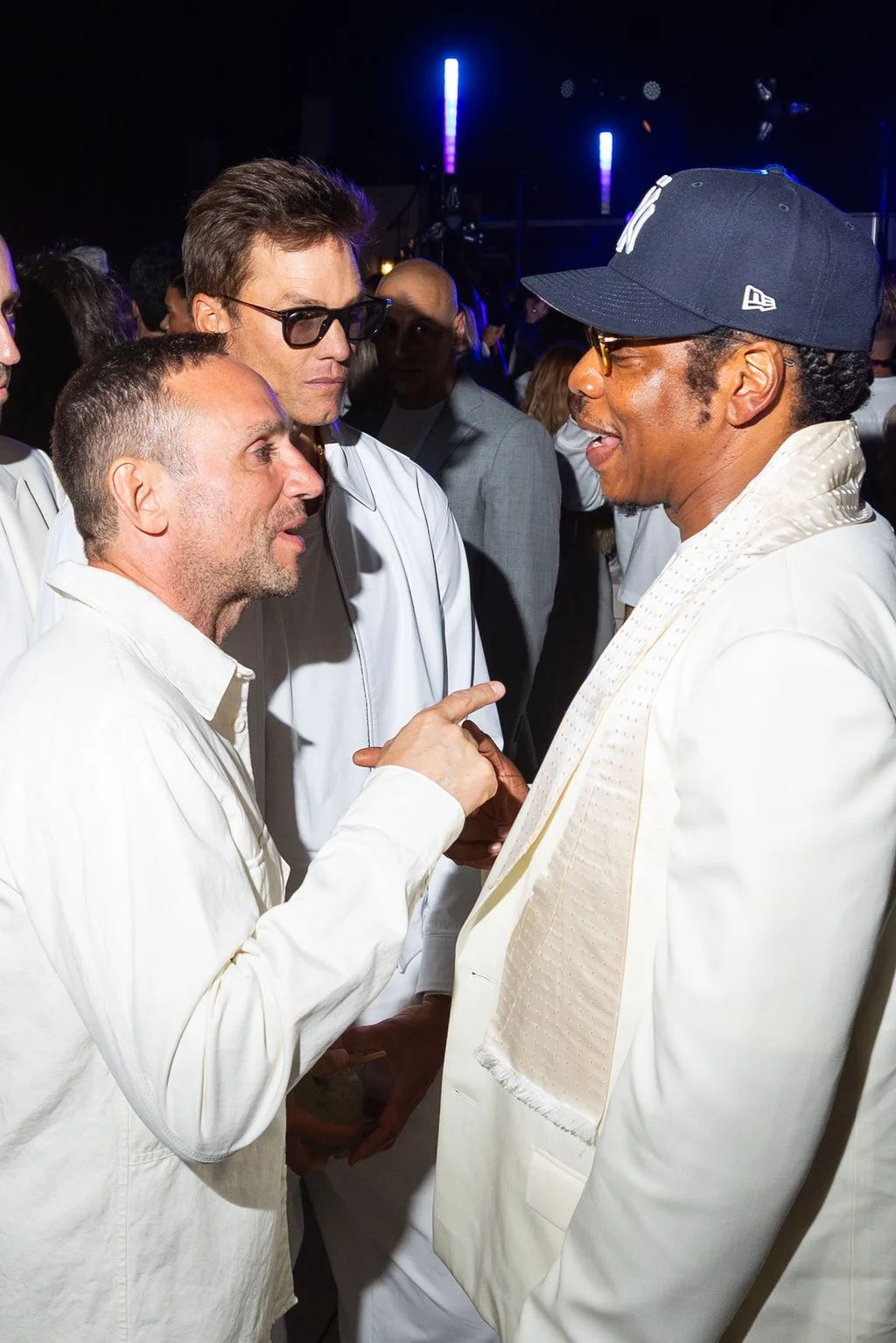 Image may contain JayZ Tom Brady Sal Solo Baseball Cap Cap Clothing Hat Accessories Sunglasses Adult and Person