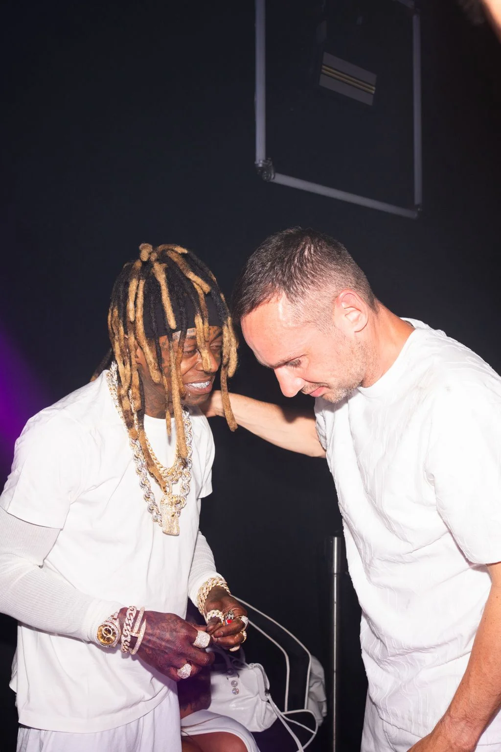 Image may contain Lil Wayne Adult Person Wedding Hair Face Head and Braid