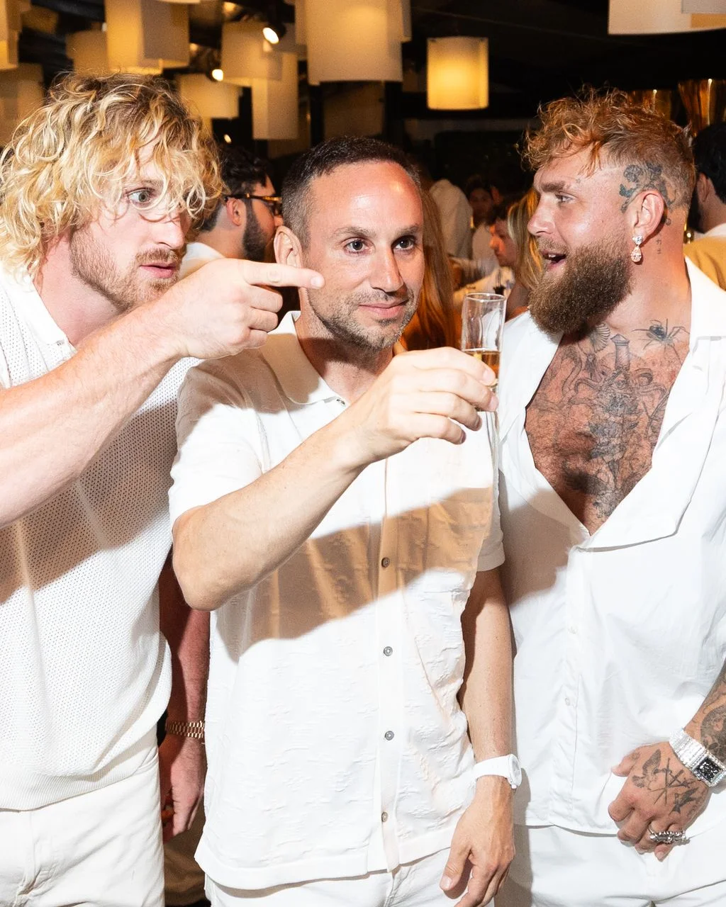 Image may contain Shane Dawson Jake Paul Jason Suecof Adult Person Fun Party Accessories Glasses Urban and Face