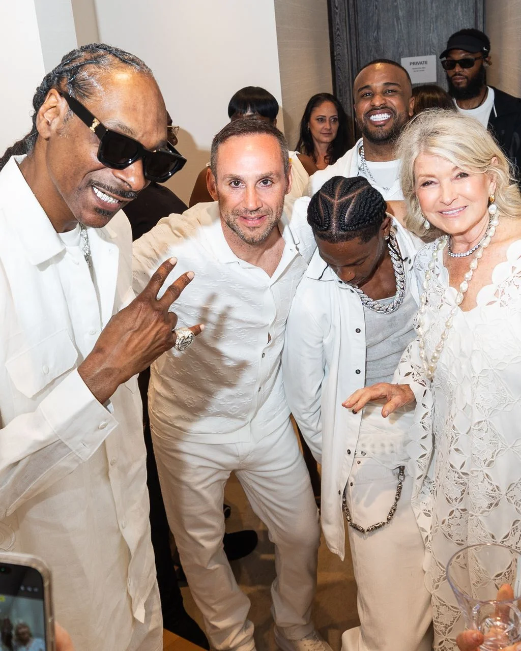 Image may contain Snoop Dogg Rob Simonsen Martha Stewart Travis Scott Fabo Billy Joe DuPree People Person and Adult