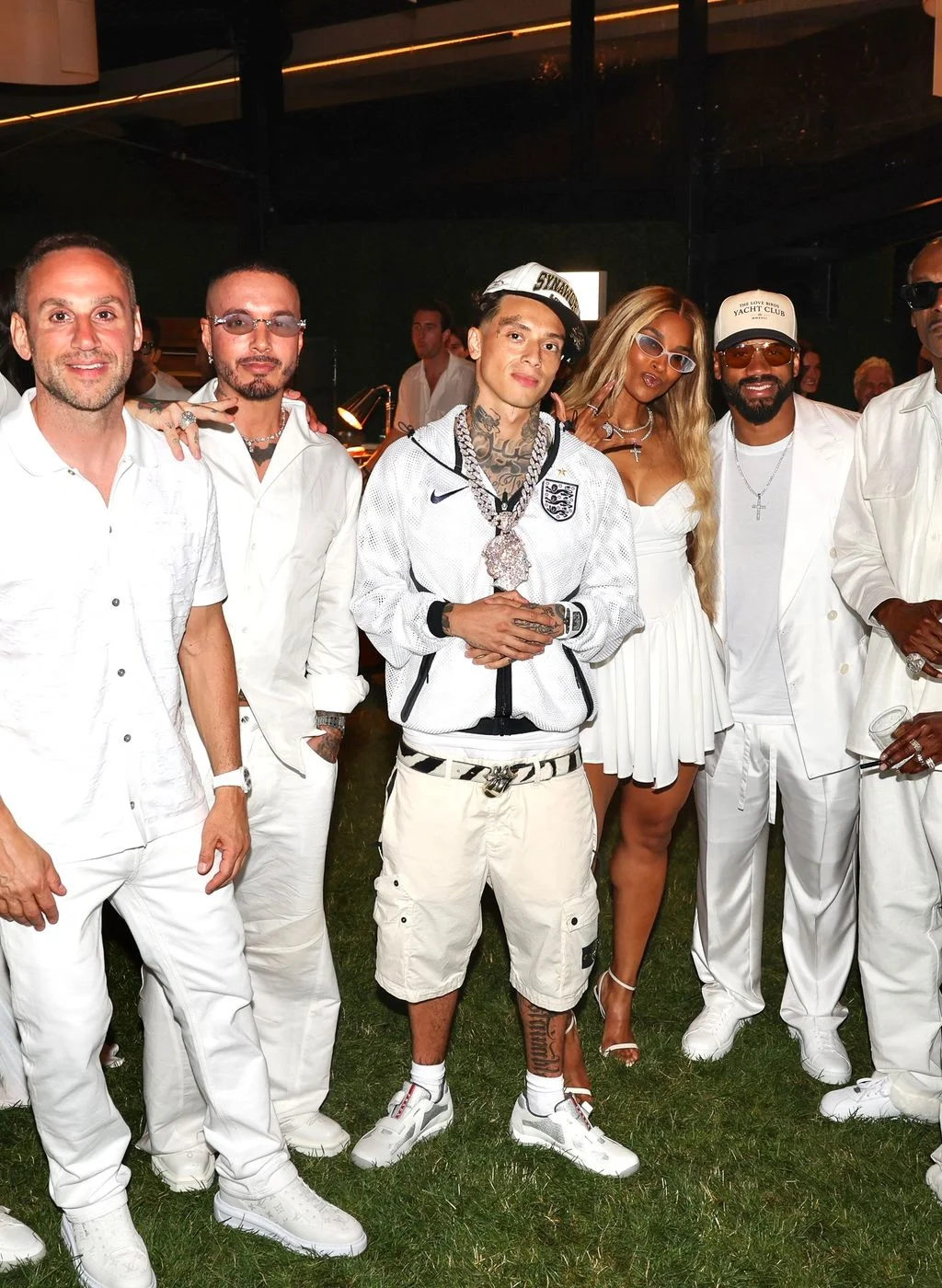 Image may contain Rob Simonsen J Balvin Russell Wilson Ciara People Person Adult Clothing Footwear Shoe and Face