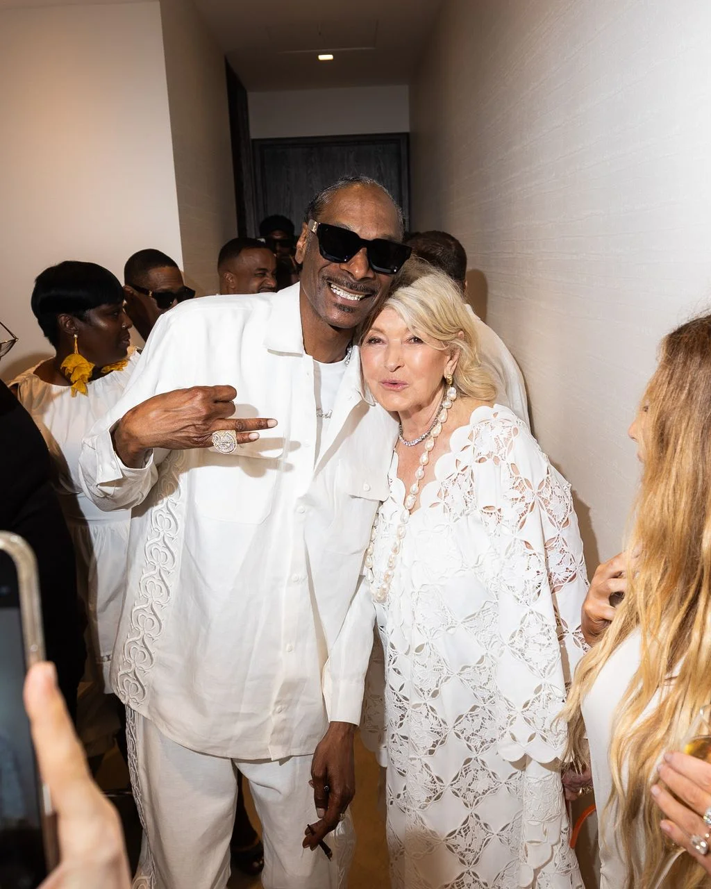Image may contain Snoop Dogg Martha Stewart Super Cat Clothing Dress Fashion Formal Wear Gown and Wedding