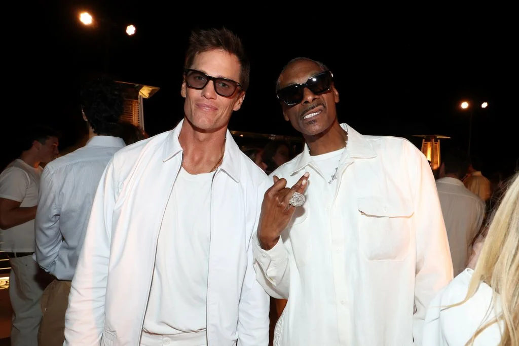 Image may contain Tom Brady Snoop Dogg Accessories Sunglasses Clothing Shirt Face Head Person and Photography
