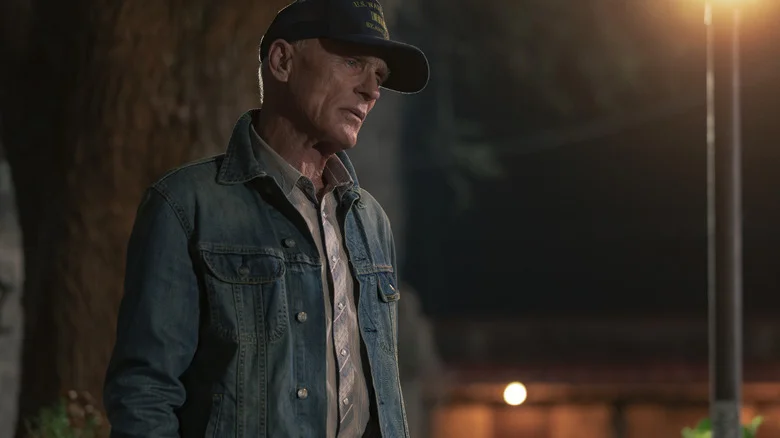 Ed Harris' Everett McKinney stands outside at night in Dutton Ranch
