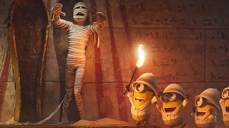 The Minions looking at a mummy in Minions & Monsters