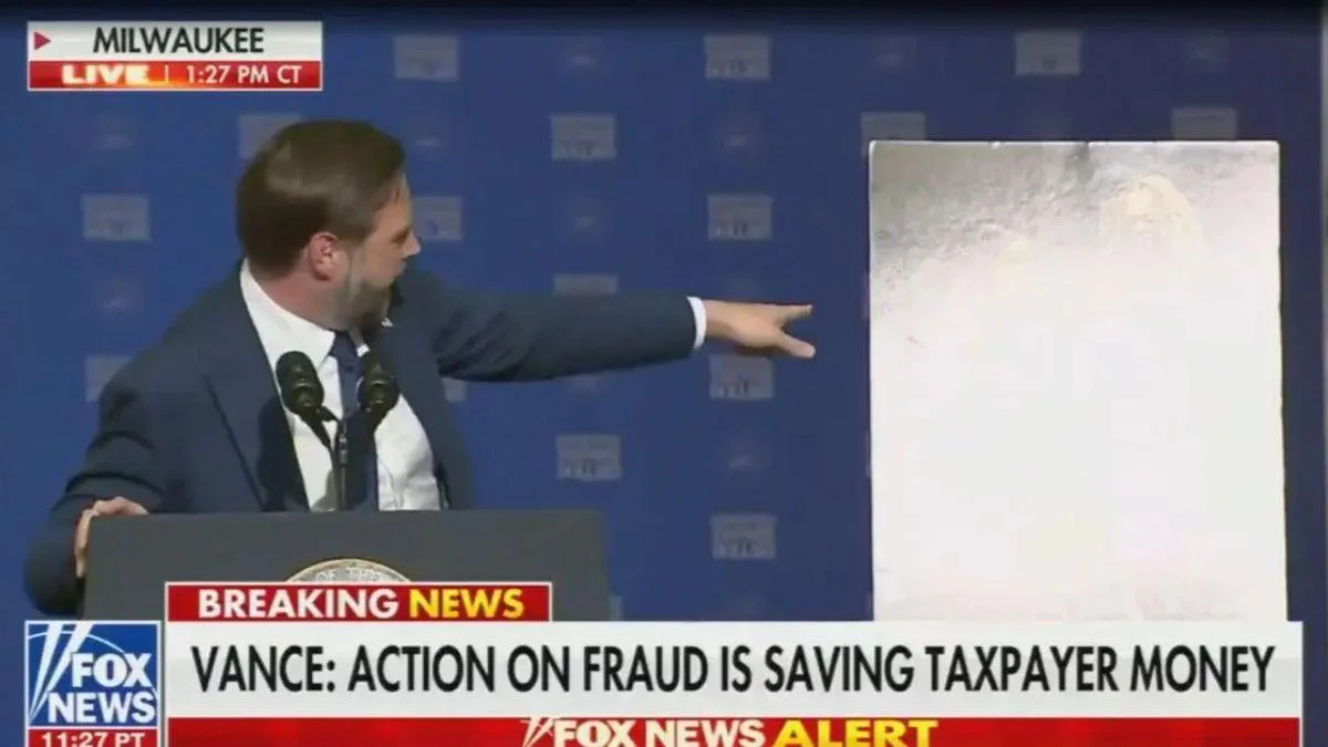 Photo of The placard J.D. Vance used in his presentation was hard to see due to a glare.