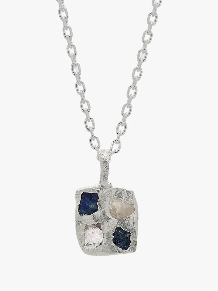 Image may contain: Accessories, Jewelry, Necklace, Gemstone, and Pendant