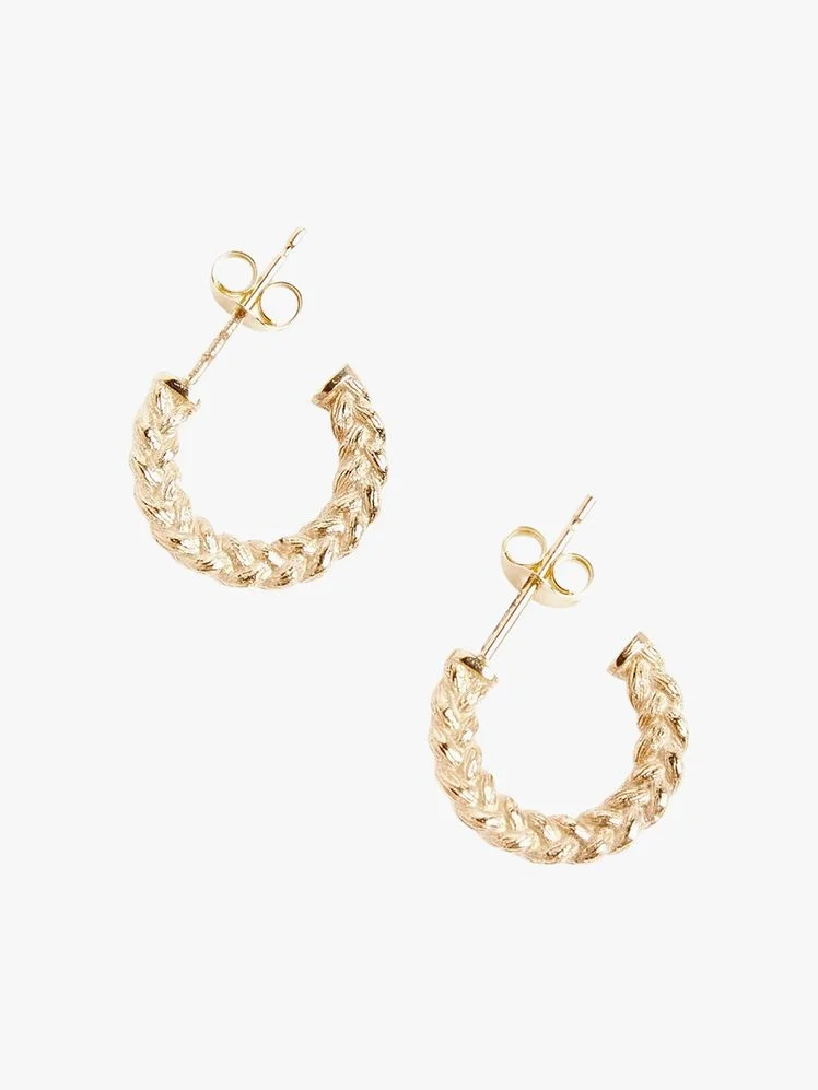Image may contain: Accessories, Earring, Jewelry, Necklace, and Bracelet