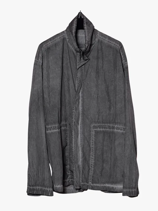 Image may contain Clothing Coat Jacket Pants Blazer Long Sleeve and Sleeve
