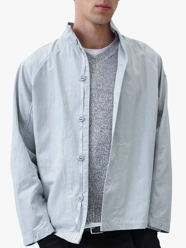 Image may contain Clothing Shirt Coat Long Sleeve Sleeve Jacket Blazer and Dress Shirt