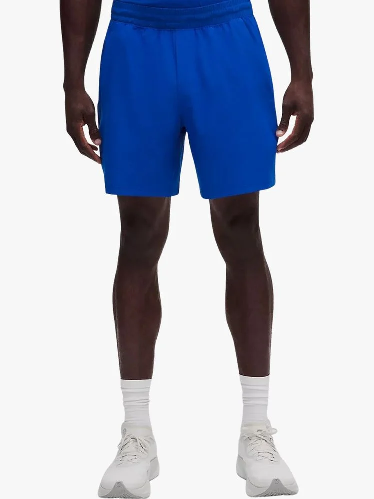 Image may contain Clothing Shorts Person and Swimming Trunks