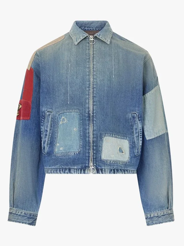 Image may contain Clothing Coat Jacket Pants and Jeans