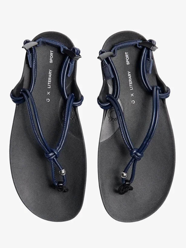 Image may contain Clothing Footwear Sandal FlipFlop and Shoe