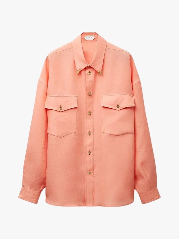 Image may contain Clothing Shirt Long Sleeve Sleeve and Coat